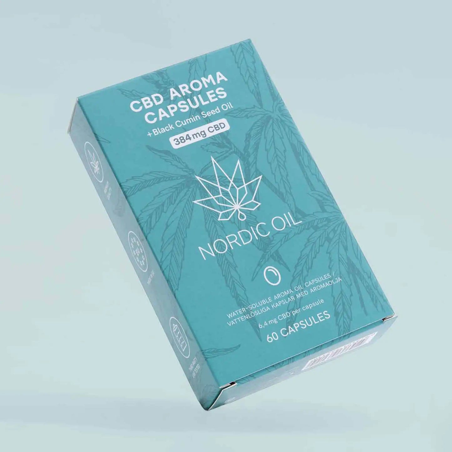 Förpackningen för CBD Aroma Kapsler (384 mg) finns på vänster sida, på en blå bakgrund.